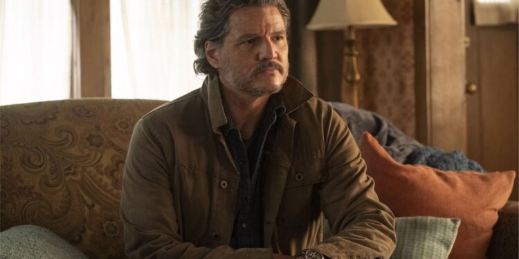 Pedro Pascal sitting on a couch