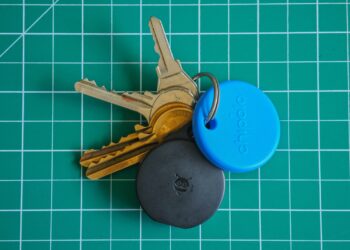 A Chipolo Pop and Pebblebee Clip attached to keys
