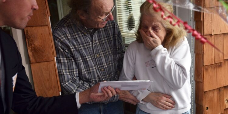 Jo-Ann Snyder receives the check from Publishers Clearing House at her home in Wilkes-Barre, Pa., in 2018.