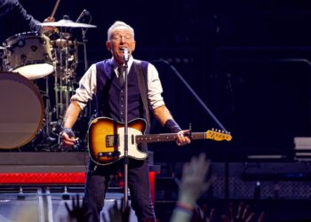 Bruce Springsteen performing at a concert in Manchester, England on May 14, 2025.