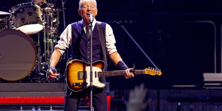 Bruce Springsteen performing at a concert in Manchester, England on May 14, 2025.