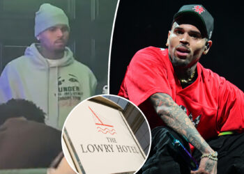 Chris Brown arrested for smashing tequila bottle over music producer's head at nightclub: report