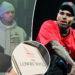 Chris Brown arrested for smashing tequila bottle over music producer's head at nightclub: report