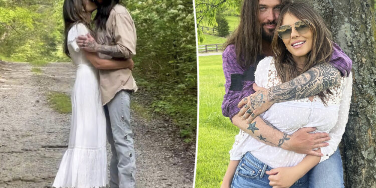 Elizabeth Hurley, Billy Ray Cyrus share steamy kiss as romance heats up