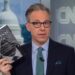 Tapper holding his Book "Original Sin"