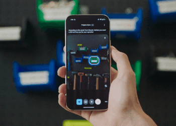 A phone running Project Astra, showing the camera pointing at some tools.