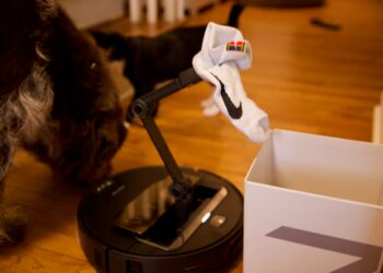 The Z70 can take objects it picks up to designated areas, including this box Roborock supplies with the robot.