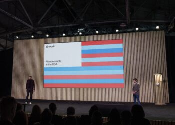 A photo of World’s co-founders onstage.