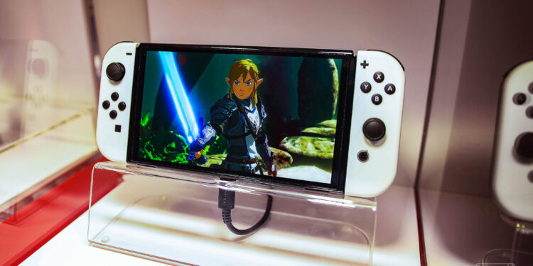 A photo of a Nintendo Switch OLED.