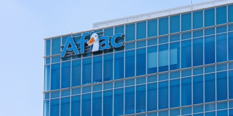 Aflac logo on a blue glass building.