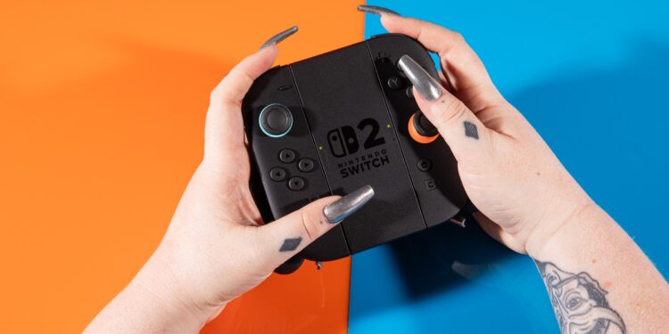 A photo of the NIntendo Switch 2’s Joy-Con controllers in their controller grip.