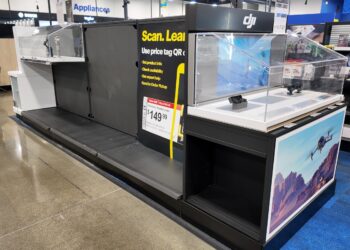 Empty shelves, missing price tags and lockers in the DJI section of Best Buy.