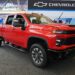 Red 2024 Chevrolet Silverado 2500 HD Custom truck.