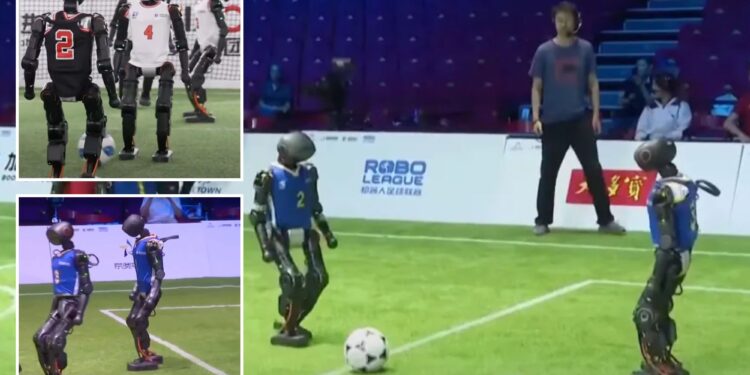 Humanoid robots compete in 3-on-3 soccer game