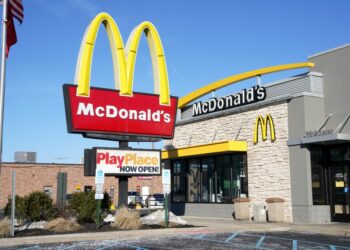 McDonald's restaurant exterior with golden arches sign.