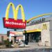 McDonald's restaurant exterior with golden arches sign.