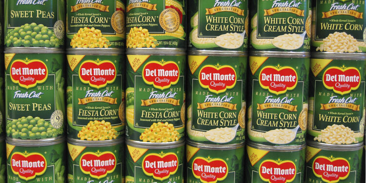 Shelf of Del Monte canned vegetables.