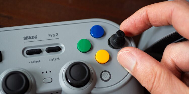 The button faces don’t come off easily without the included magnetized suction tool.