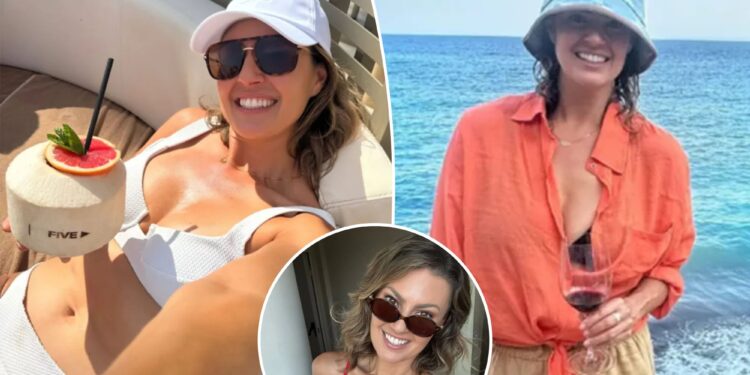 Amanda Balionis lounges in a bikini during relaxing Ibiza trip