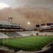 Arizona State University's Mountain America Stadium engulfed by a massive dust storm.