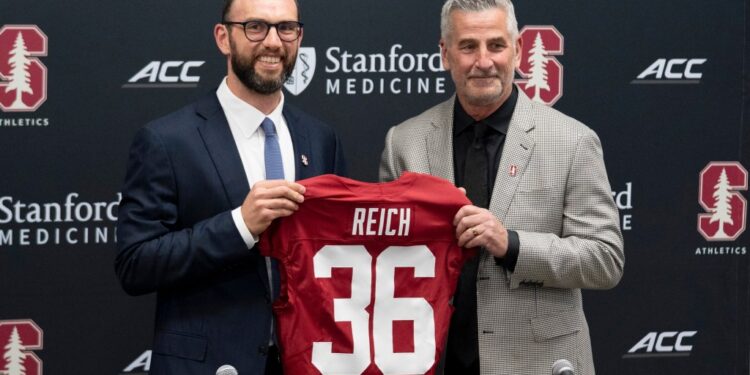 Andrew Luck and Frank Reich at a Stanford football press conference.