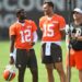 Cleveland Browns quarterback Shedeur Sanders (12) talks to quarterback Joe Flacco (15) during a practice at the team's NFL football training camp Saturday, July 26, 2025, in Berea, Ohio.