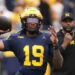 Michigan quarterback Bryce Underwood throwing a football.