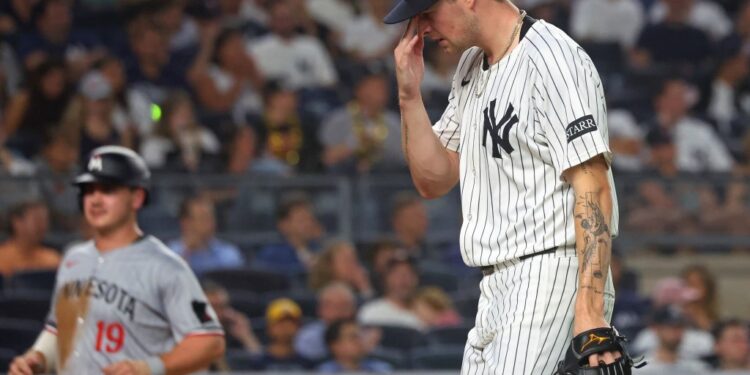 Cam Schlittler, who held Minnesota to one run, walks off the mound after getting out of the fifth inning, his final frame in the Yankees' 4-1 loss to the Twins on Aug. 13, 2025.