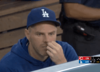 Dodgers star Freddie Freeman grabs ahold of a nose hair in a dugout moment caught on camera.
