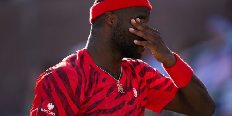 Frances Tiafoe, of the United States, reacts after a rally against Jan-Lennard Struff, of Germany, during the third round of the U.S. Open tennis championships, Friday, Aug. 29, 2025, in New York.