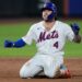 New York Mets' Francisco Alvarez celebrates after hitting an RBI double during the fifth inning of a baseball game against the Atlanta Braves Tuesday, Aug. 12, 2025, in New York.