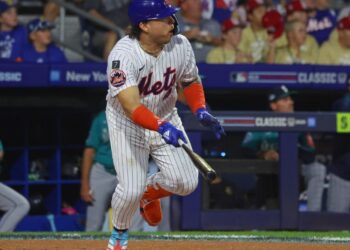 New York Mets catcher Francisco Alvarez hitting a double.