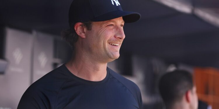 New York Yankees pitcher Gerrit Cole (45) watches the Old Timers play before the game when the New York Yankees played the Houston Astros Saturday, August 9, 2025 at Yankee Stadium in the Bronx, NY.