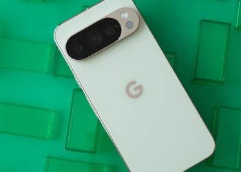 Google Pixel 10 Pro showing back panel on a grid of green rectangles