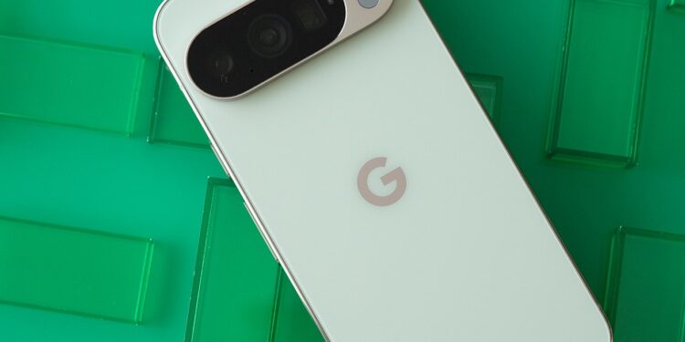 Google Pixel 10 Pro showing back panel on a grid of green rectangles