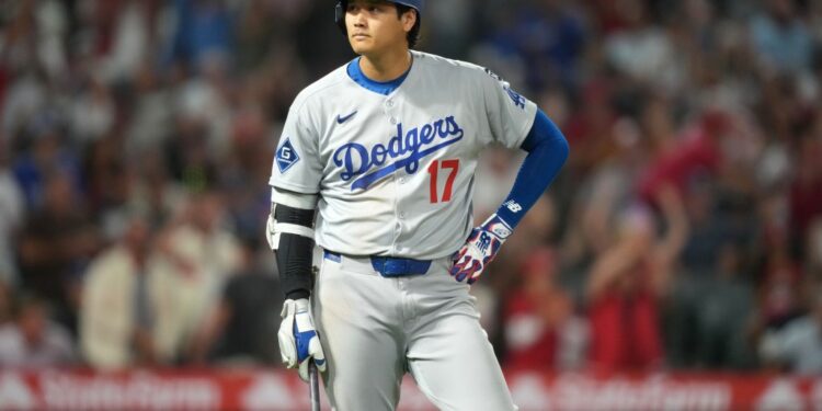A dejected Shohei Ohtani looks on after lining into a triple play during the sixh inning of the Dodgers' 7-6 loss to the Angels on Aug. 12, 2025.
