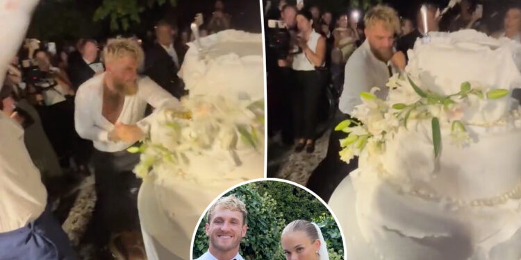 Jake Paul smashes his brother Logan Paul's lavish wedding cake in bizarre clip