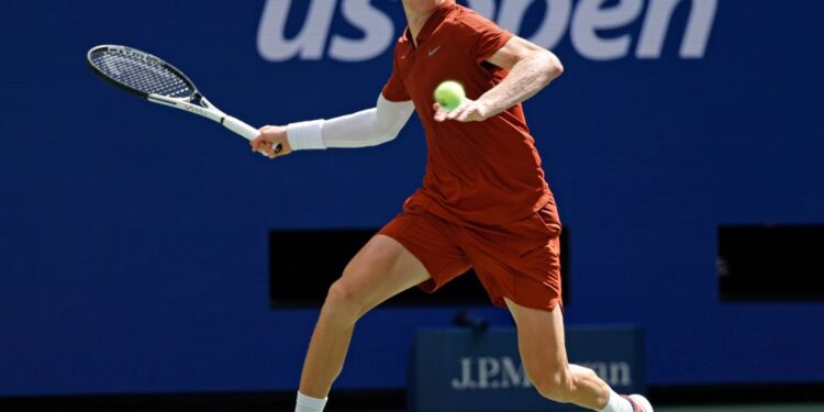 Jannik Sinner playing tennis at the US Open.