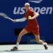 Jannik Sinner playing tennis at the US Open.