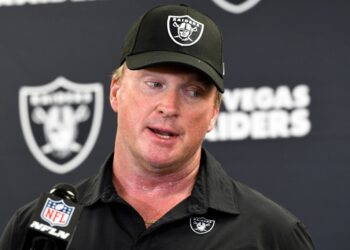 Jon Gruden speaks with the media following an NFL football game against the Pittsburgh Steelers in Pittsburgh, Sept. 19, 2021.