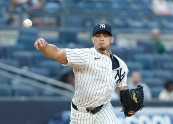 Jonathan Loáisiga throws out Tampa Bay Rays third baseman Junior Caminero during the 9th inning. The New York Yankees defeat the Tampa Bay Rays 7-4 at Yankee Stadium in the Bronx, New York, USA, Thursday, July 31, 2025.