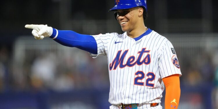 Juan Soto #22 of the New York Mets points during a baseball game.Mets outfielder Juan Soto (22) reacts after being walked against the Seattle Mariners in the third inning at Journey Bank Ballpark