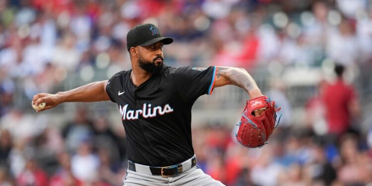 Marlins baseball pitcher throwing a pitch.