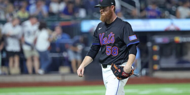 New York Mets pitcher Paul Blackburn #58, walks off the field after he was taken out of the game in the 6th inning.