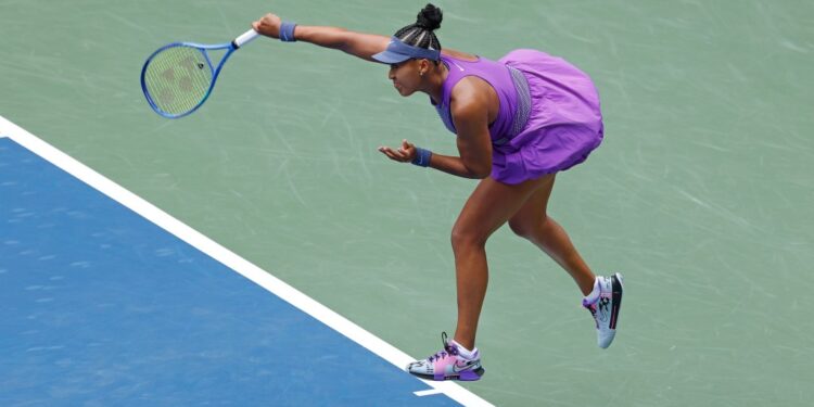 Naomi Osaka serving at the US Open.