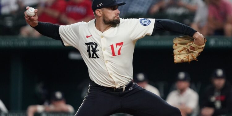 Texas Rangers pitcher throwing a baseball.
