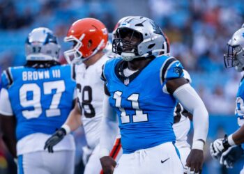 Carolina Panthers linebacker Nic Scourton (11) celebrates during the second quarter against the Cleveland Browns at Bank of America Stadium.