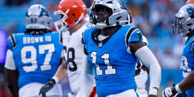 Carolina Panthers linebacker Nic Scourton (11) celebrates during the second quarter against the Cleveland Browns at Bank of America Stadium.