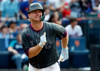 Pete Alonso running the bases after hitting a double.