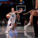 Sabrina Ionescu #20 of the New York Liberty dribbling the ball.